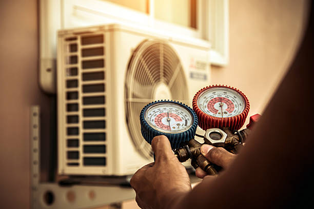 Professional Heat Pump Repair technician working in Wheatland, IN